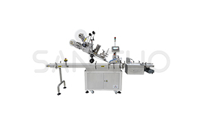 Upper surface labeling machine